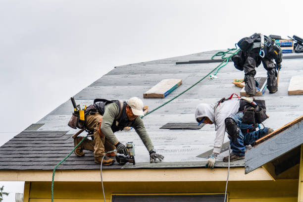 Professional Gutter Installation technician working in Akron, OH